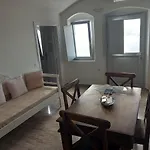 Апартаменты Captain John Oia Cave Houses - Sunset & Caldera Retreat